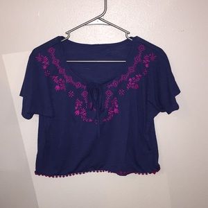 navy blue blouse, pink floral pattern